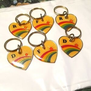 Rainbow Sun key rings dog tags
